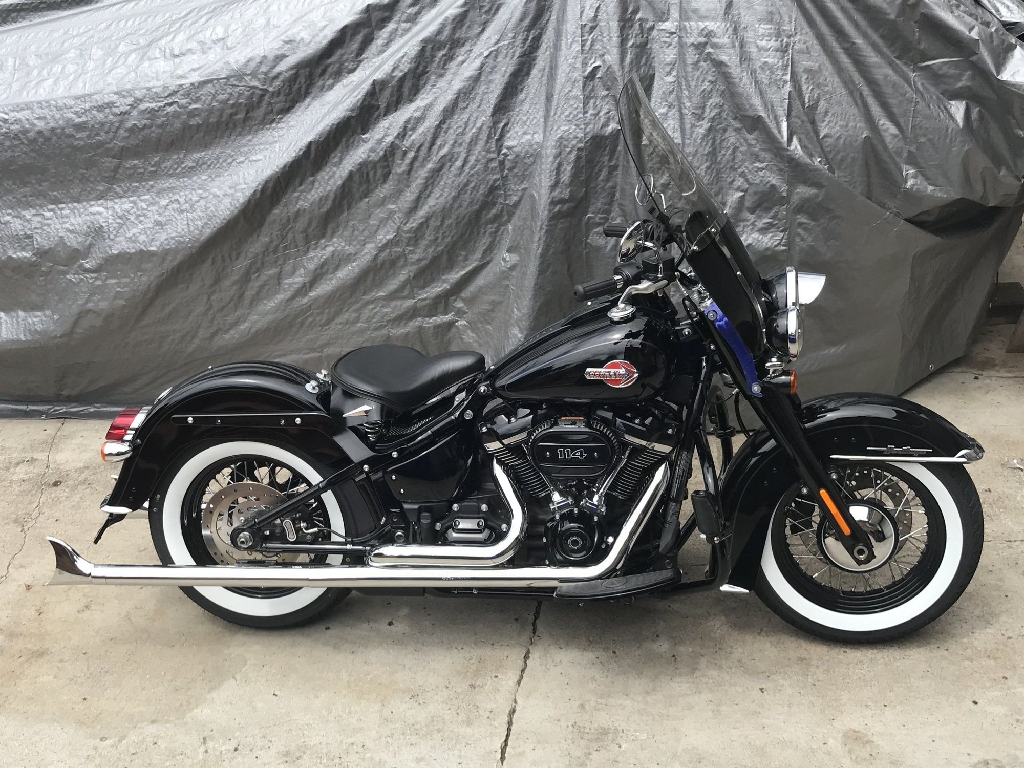 Question about solo tractor style seats for softail Deluxe Harley