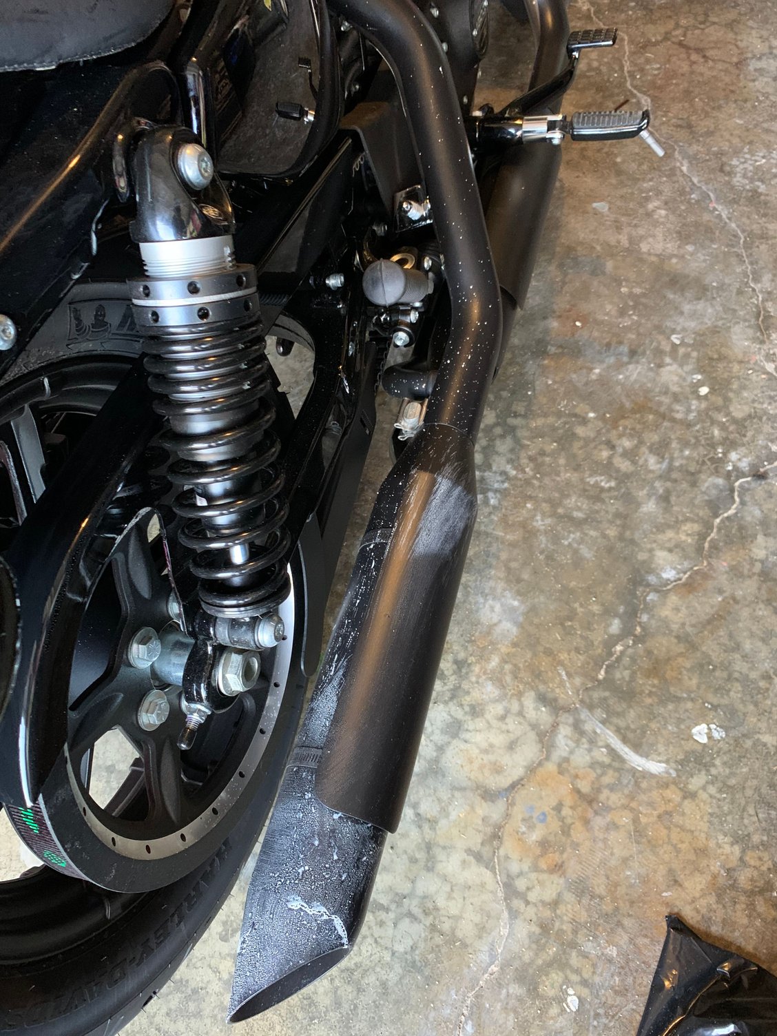 Rough idle and sputtering, also white residue on exhaust pipe Harley