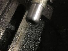 This is the thread rod, with the smooth part being the lock.  I will cut that part off once the hole is threaded.  I use the lathe to insure the threads start perfectly straight.