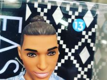 It's Barbie's new Metro Sexual Man Bun wearing friend. 