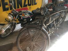 This one I especially liked, as the bike in the back is similar to my first Harley.  This one is a 90cc two stroke.  Mine was a 1967 125cc two stroke.  Bought it brand new and rode that sucker rain or shine to school and work.