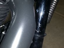 Right side view of header and frame gap. Zoom in to see the frame paint bubbling and what may be slight contact during hard downshifts