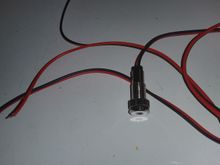 the dorman led is meant or panel mounting so it has a adjustable, knurled/threaded support. great