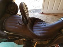 On the bike, note the minor rub mark on the piping at the edge of the seat- rubbing from my jeans.