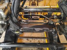 Turns out I was just test fitting the plate...  Because of the stud on the kicker side, there isn't enough clearance to squeeze it in.  Notice where the ground wire is going to go.