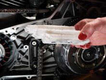 The home made tool. I cut up a nylon cutting board to make this thing.