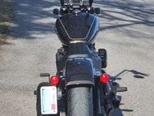Skinnier bars and a fatter rear tire. 