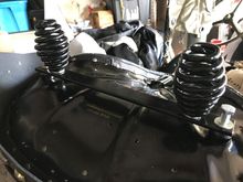 You can see the spacers ( that came with the seat) under the flat bar I made. You need these so the nut will fit in between bar and seat pan. 
