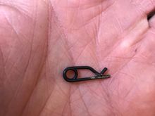 Mystery retaining pin