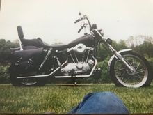 4" over forks by franks, rear shocks shotened 1.5".  needed to make a  chain guard to keep chain from eating bootom of oil tank when it bottomed out with the girlfriend (now wife) on the back. 3.5 gall fatbobs, wide glide fender redrilled to fit.  Mustang seat from a FX that I redid to fit and give me more lower back support.  Enfgine and Trans all rebuilt with all new wiring, kicck start only.  Loved that bike.