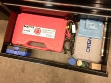 Matco tap and die set along with a dremel. I have an extra axle too that way when bikes with timken bearings come in I can take the wheel off put it on my axle and vise and check end play. Easier when it’s off the bike and you get the same results if you do it like this as long as you follow procedure.