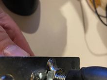 Check out the weld on the nut. The nut isn't flat on the steel, hence the alignment is off.