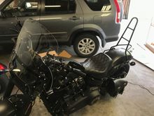 My Edward Richie sissy bar came in today. Looking forward to a Labor Day road trip. 
Sorry for the messy garage, woodworking project in progress. 