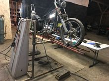 Yes your correct that would be an old commercial wheel chair lift from a local college TSTC it redneck engendered to be a motorcycle lift lol 😆 