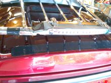 There's a couple of layers of vinyl window cling on the tour pack at the places the assembly pads sit to protect the paint; zero scuffing.  Cut the ty-wraps, remove the assembly,  There are a couple of layers of black electrical tape on the rack where the assembly sits on it partially, or where the ty-wraps hold one to the other.