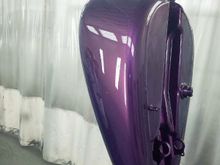 The fuel tank is gloss candy purple.