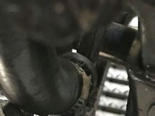 Tough to see but seems to be attached to some section of the frame