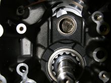 Look in the upper left area and you will see the hole with the wire sticking out of it that goes to the engine crankcase.