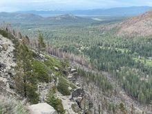 A view of the Tahoe basin looking north east towards Lake Tahoe in the distance. This is a view along California 50.