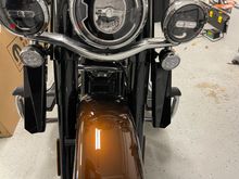 Left side (when sitting on the bike) close the fairing, the other side mounted away. 