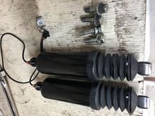 Air shocks have a lot of miles and the rubber is ripped. But they don't leak and worked like new when I took them off for Progressives. $50.00