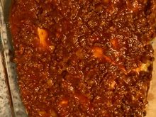 Lasagna layering meat sauce