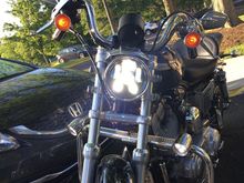 High beams. The bike came with the goofy extra lights on the engine guard, and I see no need to remove them, as any extra lights can help.