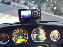 My XM ONYX mounted above the speedo and tack in front of the windshield vent hole