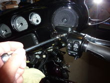 remove the front brake lever and master cylinder.