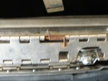 strap removed and latch spread open