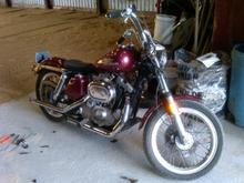 Getting rid of extra parts. Saddlebags-gone, saddle seat-gone, windshield- gone. Now we're getting somewhere!