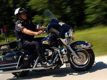 A Motor Officer Friend I photographed.  The Tinley Park Police Department uses this photo on their official website.