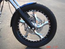 FRONT WHEEL - Right
21" Renegade Elite Multi-Piece (vs 19" Stock)
Matching Full-Floating Rotor
Powdercoated Fork Lowers
Chrome and Black Bolt Covers