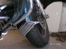 A 5 inch rock at 70 mph on I-70 took me down hard.  Locked up the front wheel and I got to go for one of the bad rides...