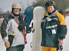 too old to ski..been snowboarding for 20 years (age 63) with my brother, left (age 61).
its fun when you hear the kids say,
"did you see how old those dudes were?"