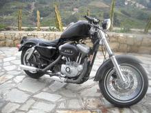 the fat forks do work nice with the fat rear shokx, n the wrapped pipes, i need to work some steering angle, a bit tough manouvering downtown

still so sikk