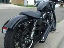 My '09 harley Nightster with smoked turn-signal covers.
