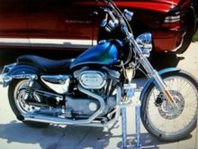 02 sportster, 883 converted 1230, stg 3 buell heads, cams, flat top pistons, ignition, and a RB racing LSR race pipe... 128hp on the ground. :-)