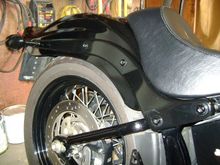 Removed the reflectors and painted the fender bolts.