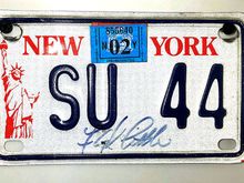 Older style off ff my metric cruiser. This plate is signed by Pro & College Football Hall of Famer Floyd Little. He work 44 at Syracuse.