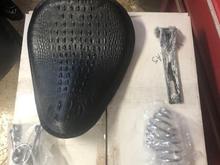 Seat kit new not leather, everything you need for that chopper look. Not showing is a seat pan for mounting