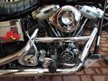 previous owner probably put a little money to up  date the motor with chrome covers, it still has the OEM electronic ignition !