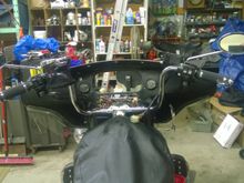 Bars with grips and controls in place for positioning.