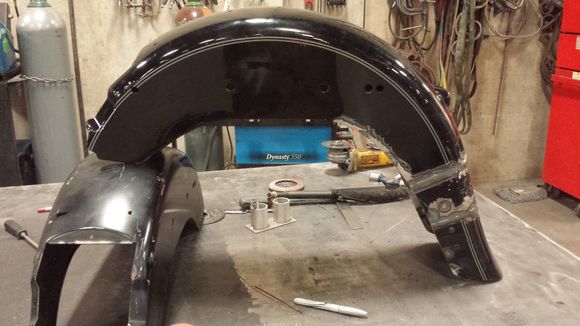 Finish welds done. I plugged all of the necessary holes, but decided to keep the rivets in the stock section of the fender to keep the "old school" look.