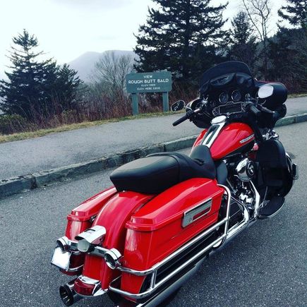 second favorite photo op. Rough Butt Bald. note the temporary un-lit tag mount. used zip ties and some tape on the back of the tag to keep it from scratching the chrome on my bag rails.