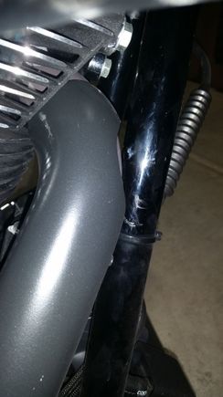 Right side view of header and frame gap. Zoom in to see the frame paint bubbling and what may be slight contact during hard downshifts