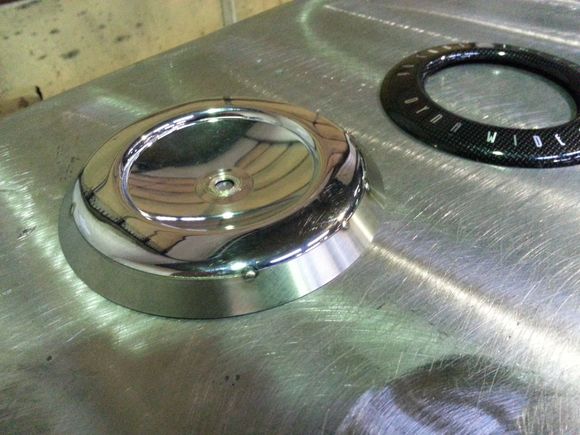 I went ahead and fabricated a stainless steel reducer then welded and polished it out.