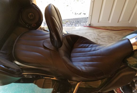 On the bike, note the minor rub mark on the piping at the edge of the seat- rubbing from my jeans.