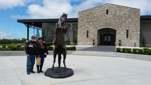 Suzie and I outside the entrance to the Dark Horse winery.