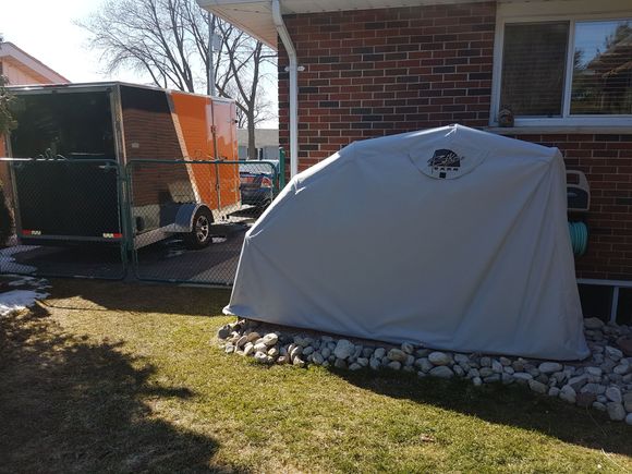 Built the Bike Barn today, worked on the trailer. Now if the damn snow would melt so I could get the bike out the shed.